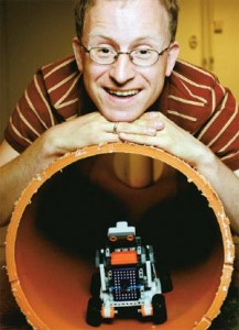 ASSISTANT: Jens Thielemann is using a lego robot in a pipe system as a first step in developing a new inspection robot. Photo: Kristin Svorte