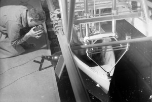 Early days. An unknown researcher photographs the performance of a hull model in the Towing Tank. Photo:Schrøder, Sverresborg Trøndelag Folkemuseum