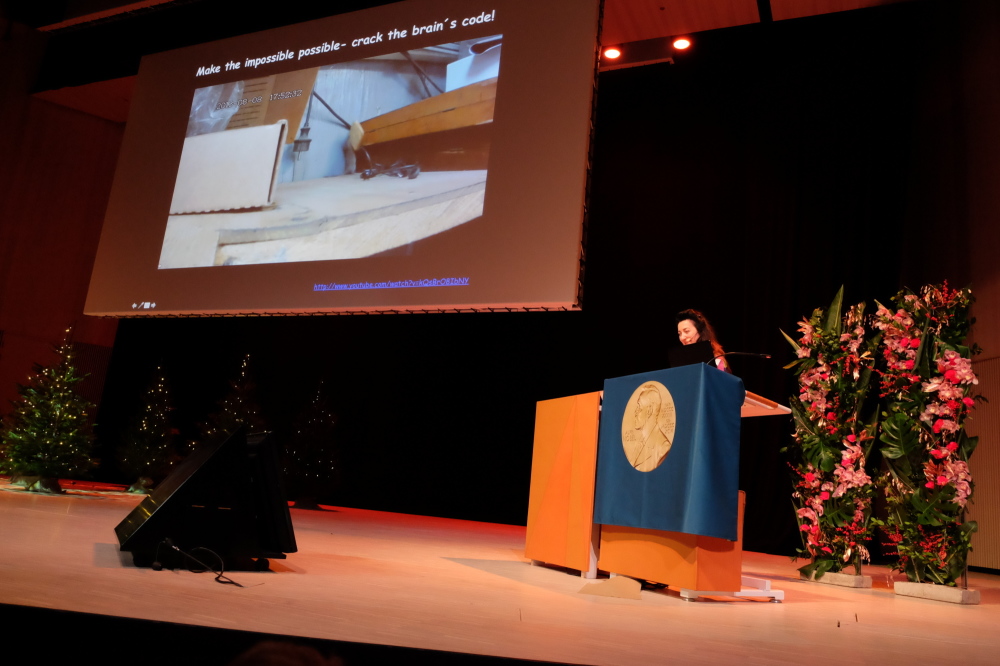 May-Britt Moser shows a video during her Nobel Lecture on 7 December that illustrates how persistence and determination can make "the impossible possible." Photo: Gunnar K. Hansen, NTNU