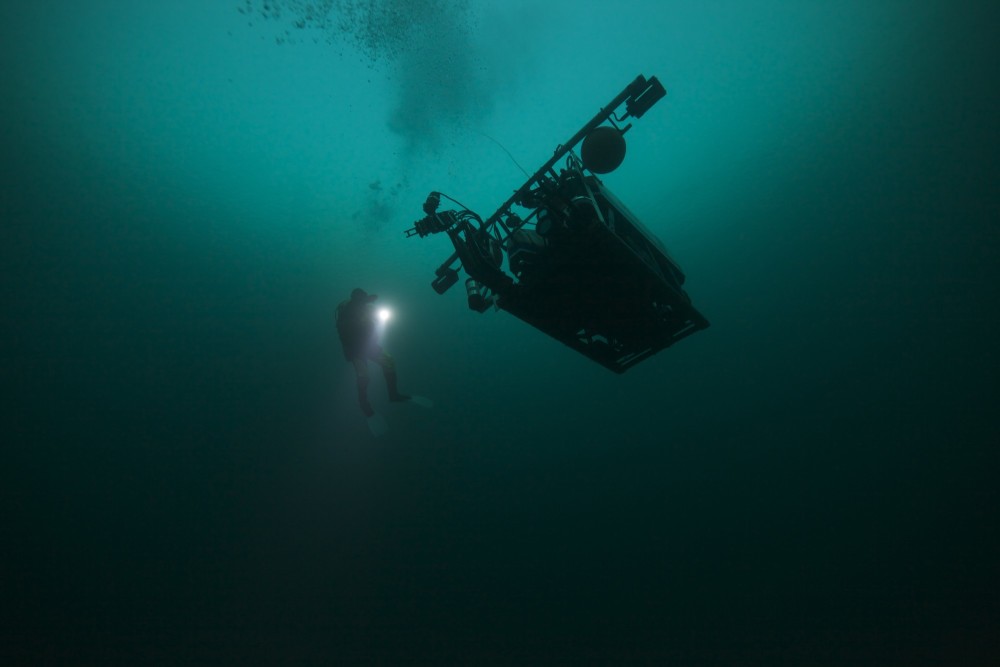 Researchers double-check a Remotely Operated Vehicle (ROV) from NTNU's AUR Lab in the sea off of the island of Frøya before the ROV gets sent off into the Arctic polar night. Photo: Geir Johnsen, NTNU/UNIS