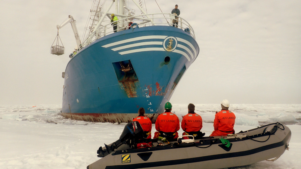 The RV Lance in the ice as researchers head out to make measurements. Photo: A. Shestov