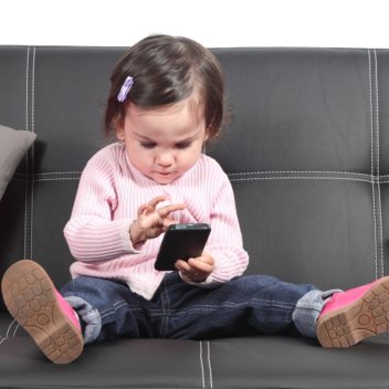 Nowadays it’s almost impossible to prevent children from accessing news and fake news from around the world. Photo: Thinkstock
