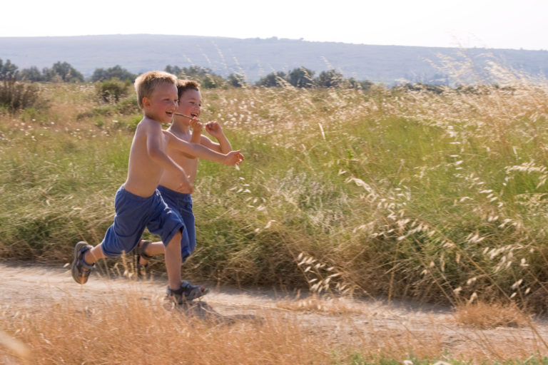 Kids running outdoors