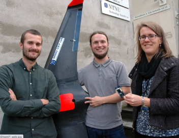 Three Researchers with a drone
