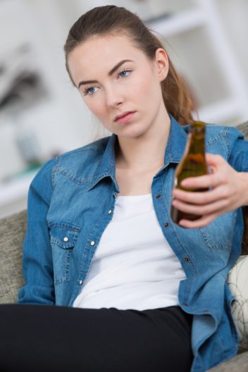 annoyed girl with a beer