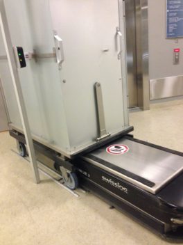 Hospital robot loading a cart