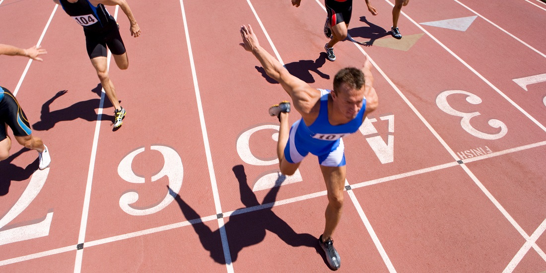 A man winning a sprint competition