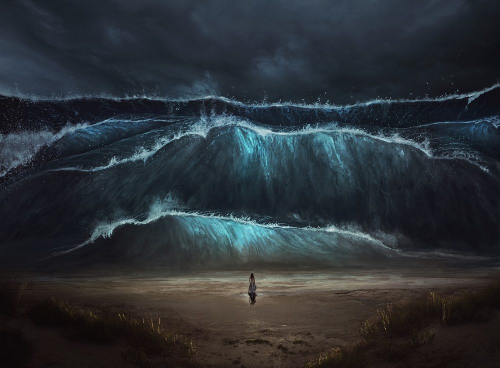 Woman in front of big waves