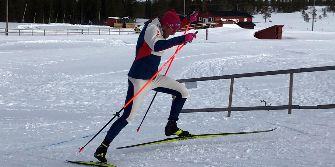cross country skier going uphill