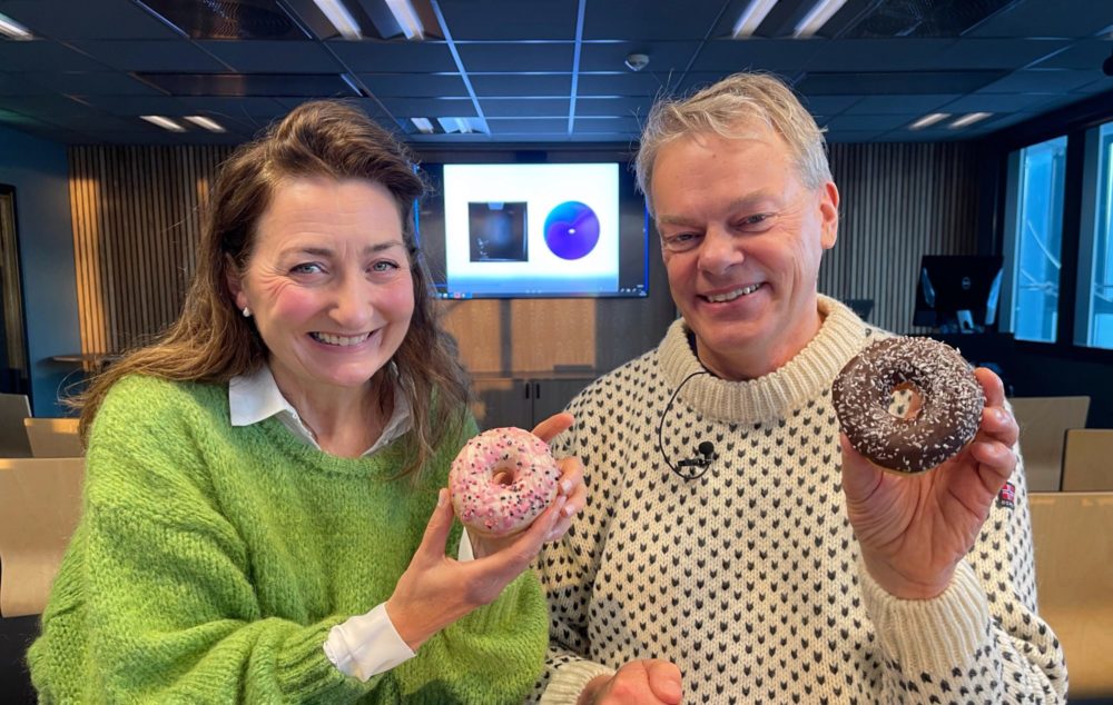 May-Britt and Edvard Moser with doughnuts
