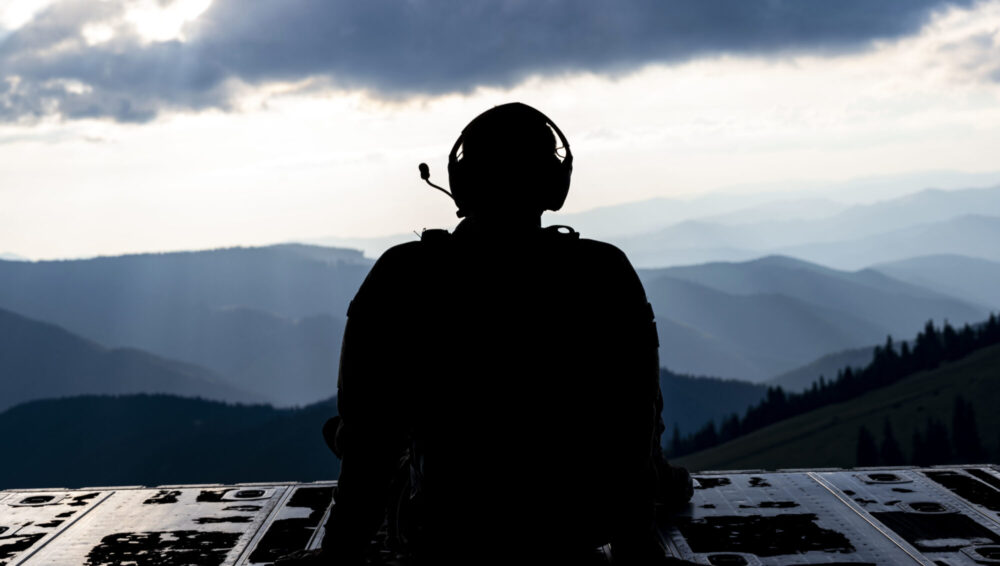 The picture shows a silhouette of a soldier.