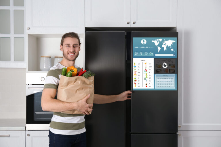 Man in front of smart refrigerator