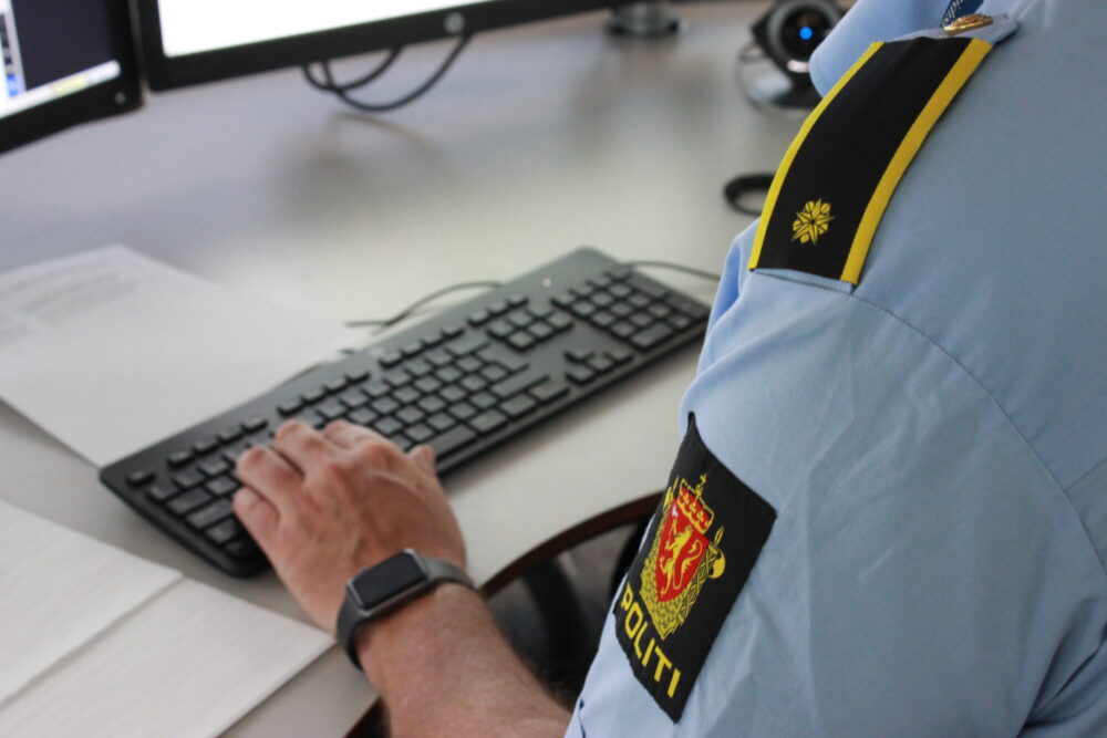 Norwegian policeperson at computer