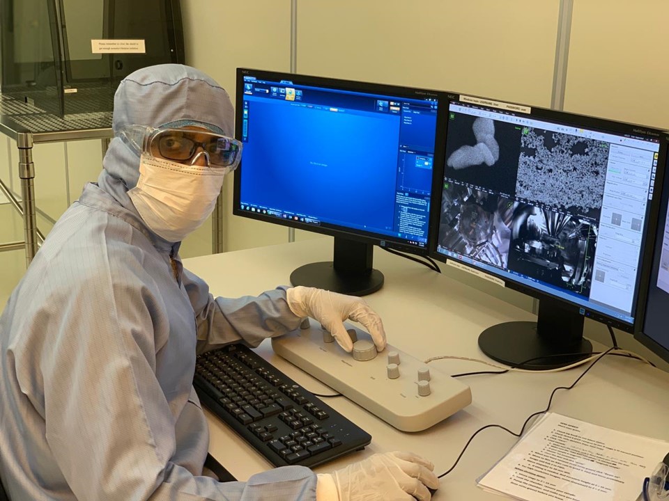 Man in clean room wearing special ultra-clean clothing