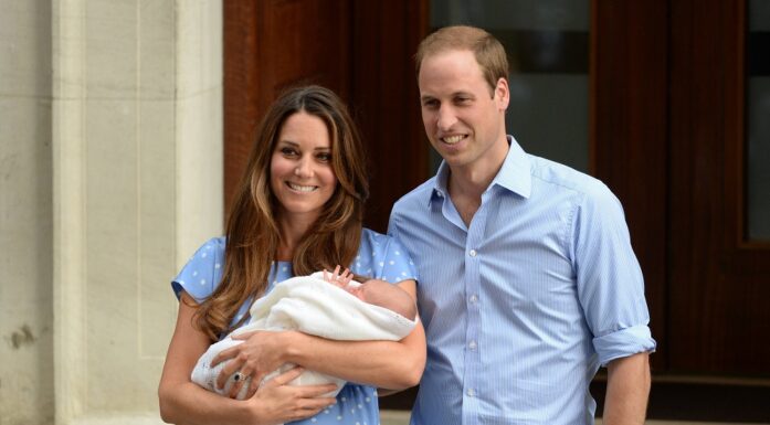 Kate with baby in her left arm