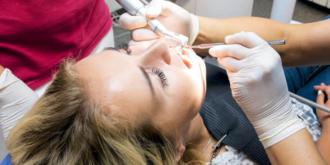 woman getting dental check
