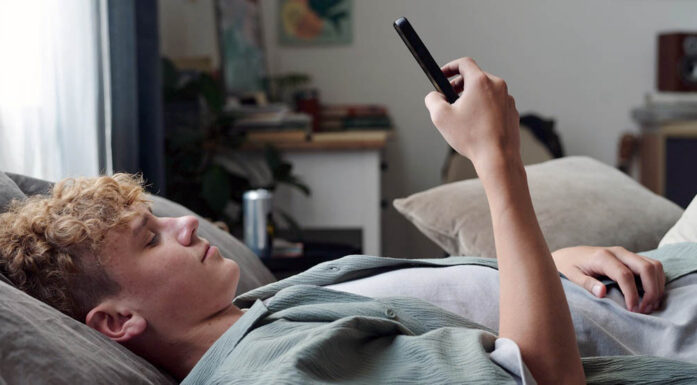 teenager on his phone