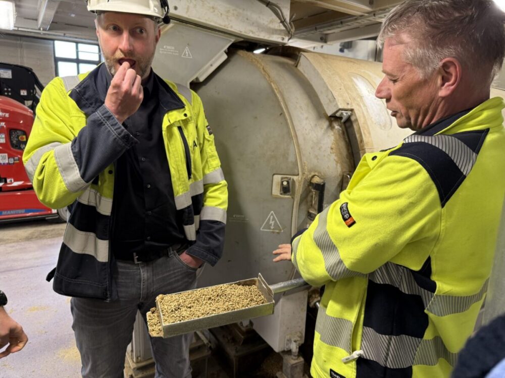 Christian Schlemminger considers tasting the feed that has just been pressed into pellets