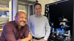Emre Yaksi and Anh-Tuan Trinh in the lab.