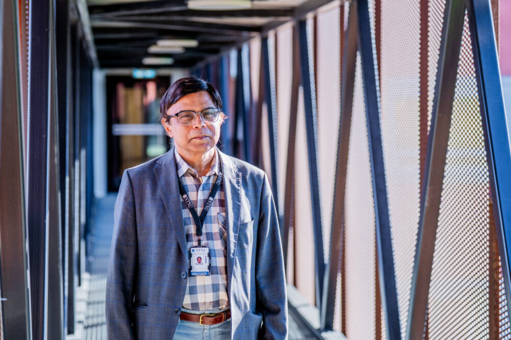 Professor photo in a corridor 