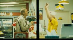 screen grab from movie Raising Arizona, with a petrol station heist in progress