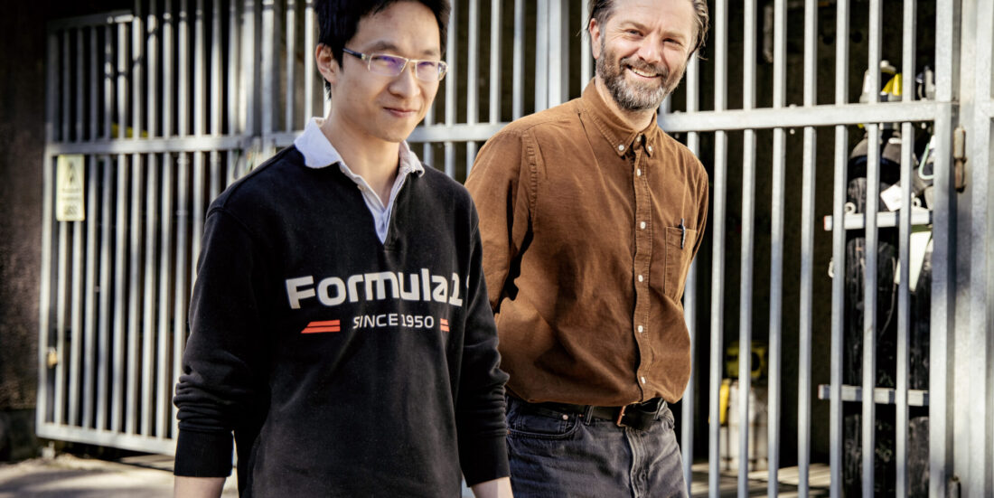 Two researchers walking outside